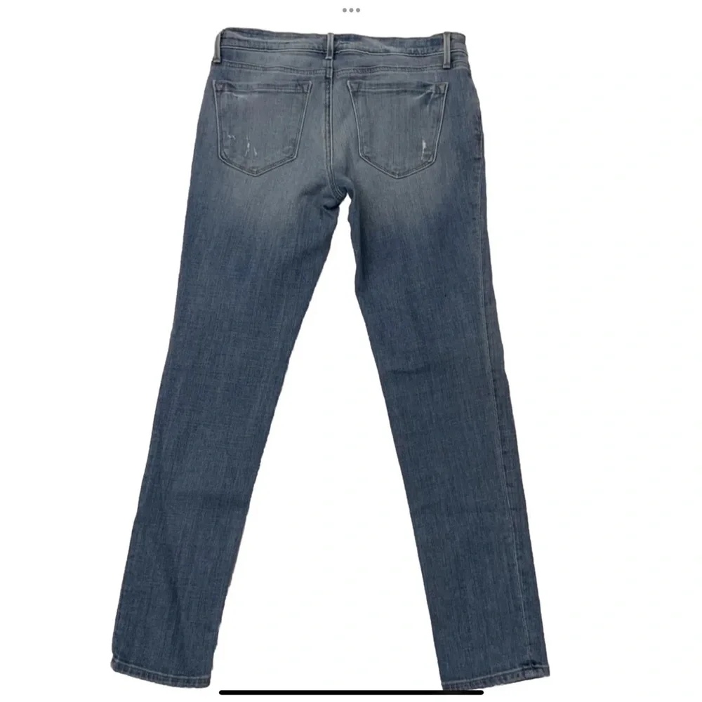 Ann Taylor Loft Relaxed Skinny Jeans
Size 2/26
Light Wash Distressed Denim - Picture 2 of 16